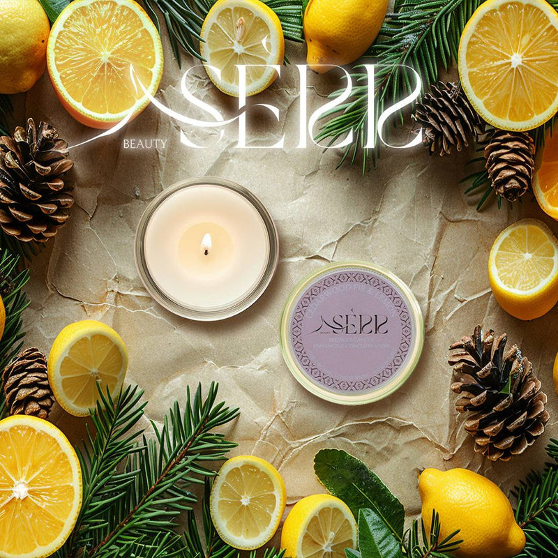 SerrBeauty Cedarwood, Fir & Lemon Beeswax Scented Candle 125 G in a round tin, surrounded by fresh lemons, fir branches, and pinecones. A natural, organic candle with a refreshing woodsy and citrus aroma.