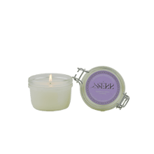 SerrBeauty Lavender & Patchouli Beeswax Scented Candle in a glass jar with a secure lid. Handcrafted organic candle infused with essential oils for a calming ambiance.