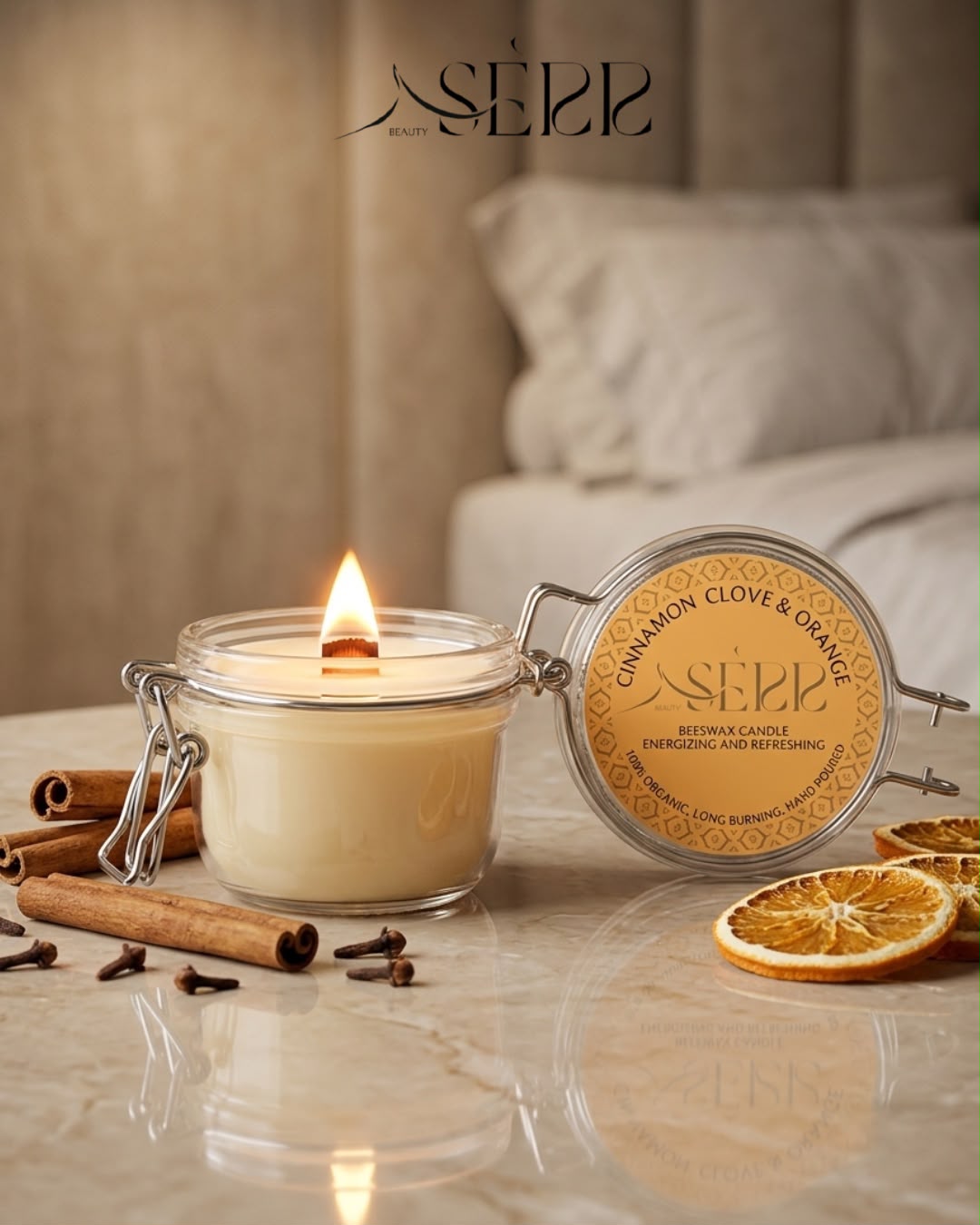 SerrBeauty cinnamon, clove and orange beeswax candle 125g burning in a glass jar with warm natural styling