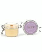 Lavender & Patchouli beeswax candle 125g with open glass jar and front label