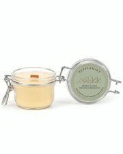 Peppermint beeswax candle 125g with open glass jar and front label