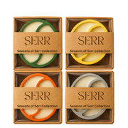 The Complete Seasons of Serr Collection with four dual-scent natural candles by SerrBeauty
