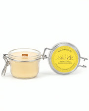 The Original beeswax candle 125g with open glass jar and front label