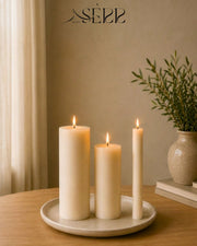 Three everyday unscented rapeseed wax pillar candles styled for warm home decor