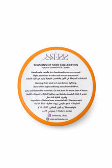 SerrBeauty Autumn Ember dual-scent natural candle in concrete vessel with label