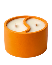 Orange concrete vessel with dual-scent candles and wood wicks