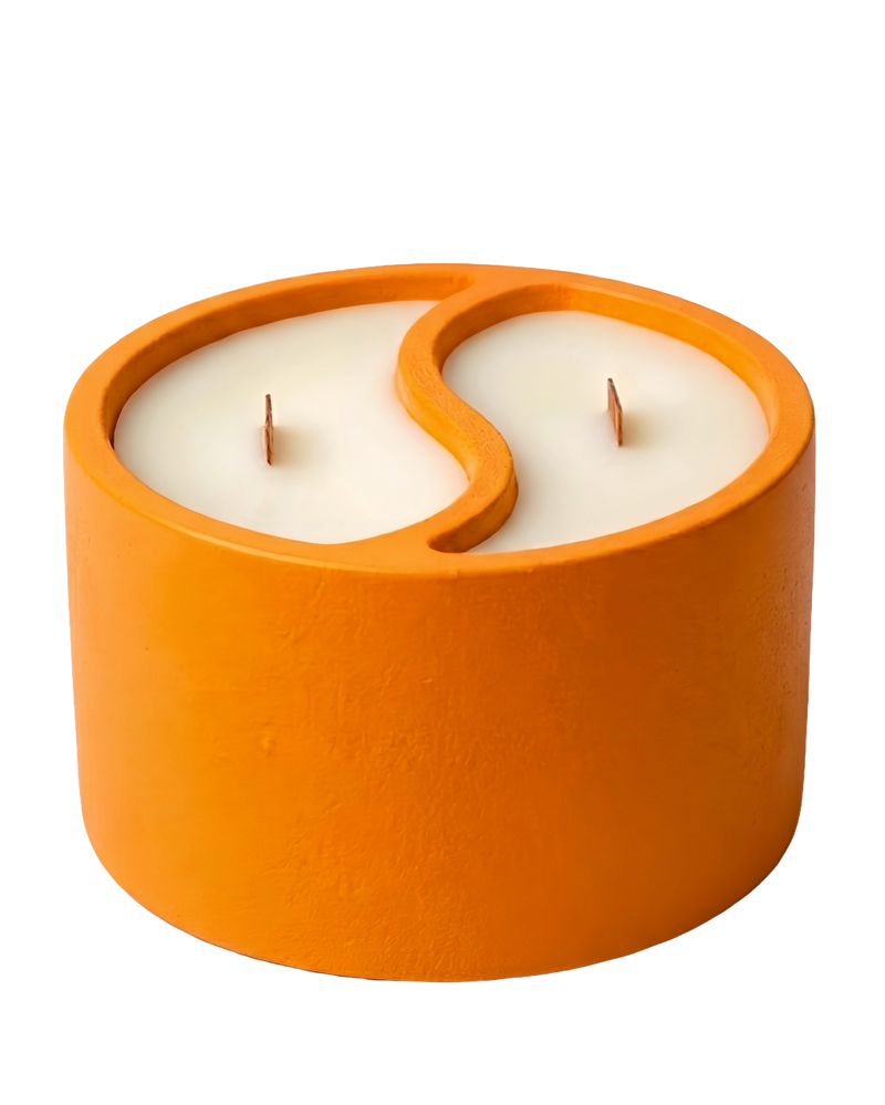 Orange concrete vessel with dual-scent candles and wood wicks
