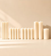 Everyday pillar candle set with 15 natural rapeseed wax candles arranged by size