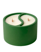 Green soy wax candle with dual-scent design