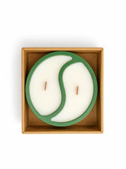 Green soy wax candle with dual-scent design top view