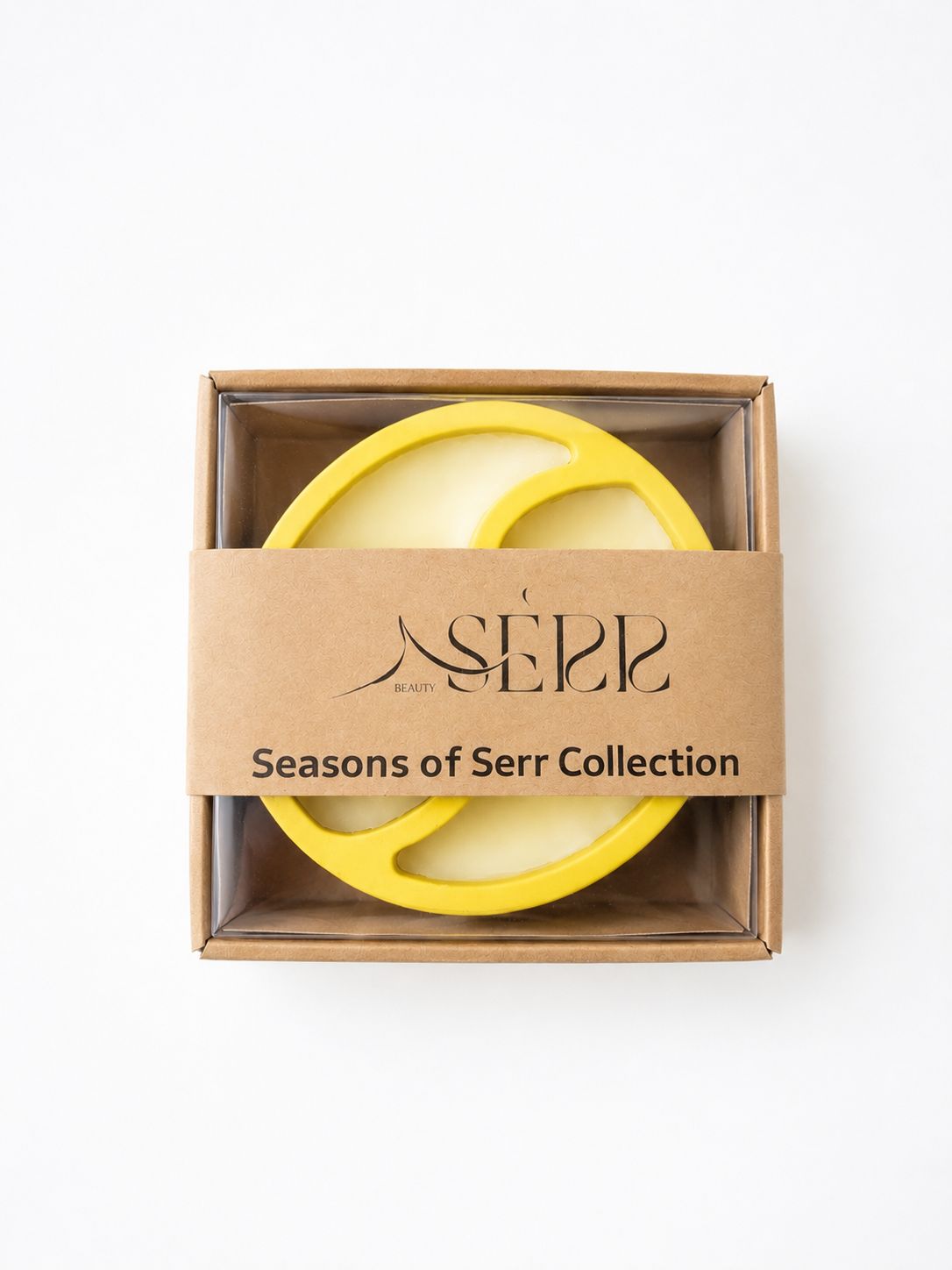 Top view of Seasons of Serr candle with label and packaging