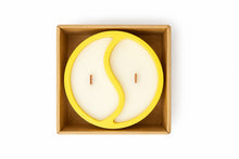 Top view of Seasons of Serr candle with product details